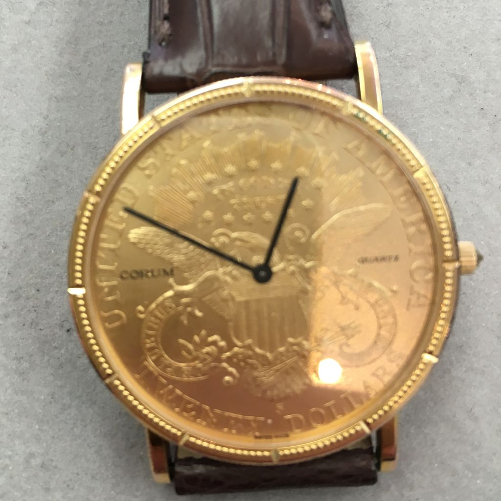 Gold Corum Watch