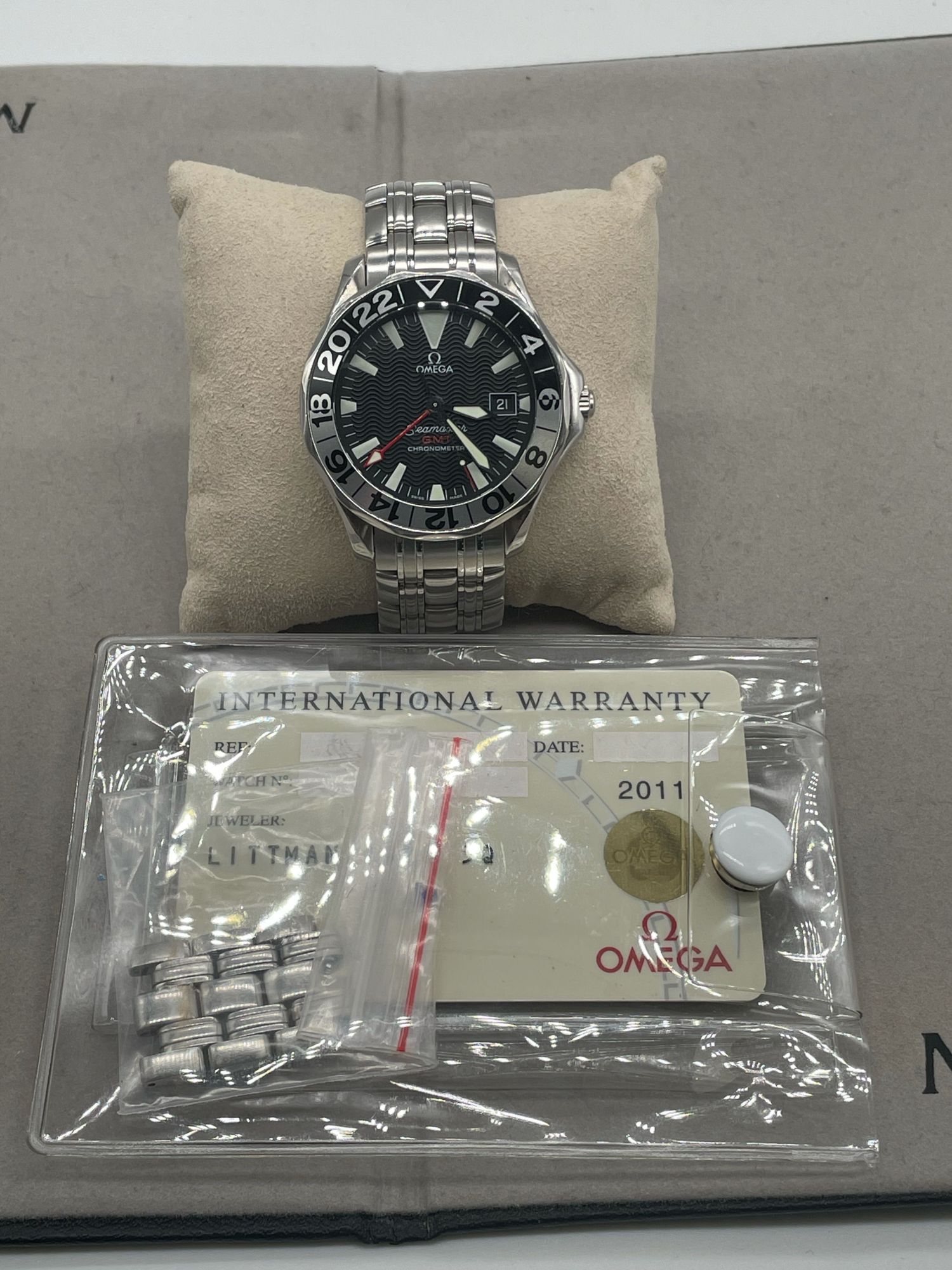 Mens stainless steel omega gmt from 2008 with open card 41 mm near mint condition