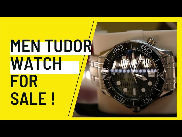 This is a 2019 Men black face blue bezel mint condition Tudor Geneve that made by Rolex.